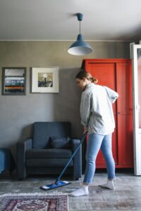 Woman Mopping Floor